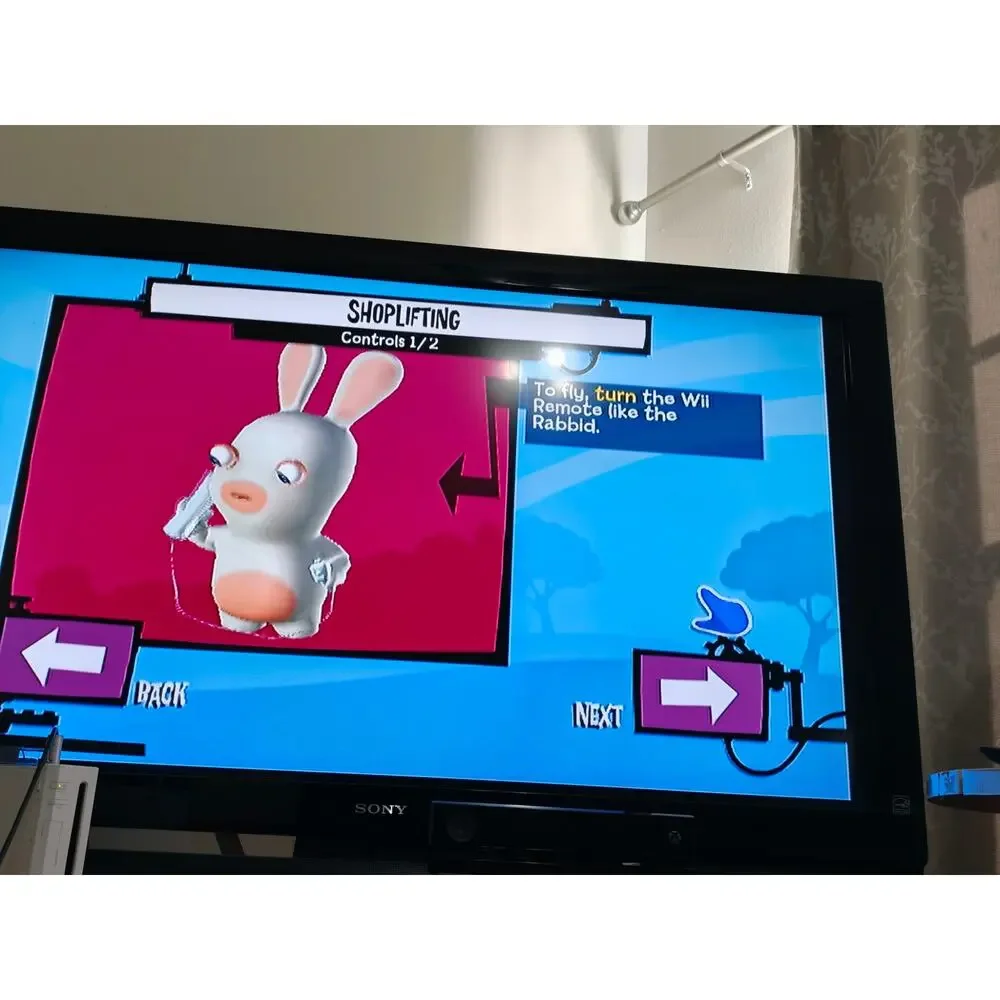 Rayman Raving Rabbids TV Party Nintendo Wii CIB Manual